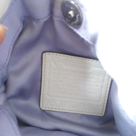 Coach white leather mini bag with red flower detailing. Comes in dust bag. - Picture 3 of 4